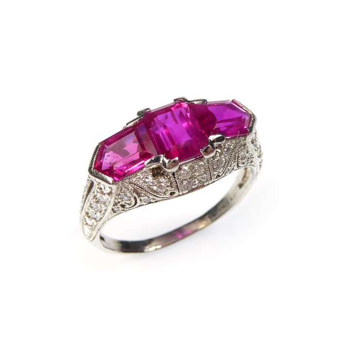 Three stone rectangular cut ruby and diamond cluster ring